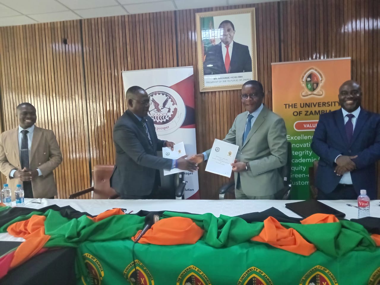 Vice Chancellors exchanges signed documents with ZACCI President Mr Antony Kabaghe